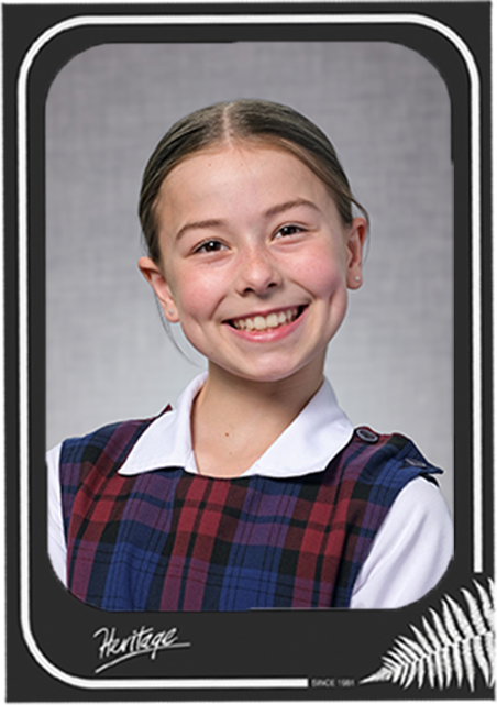 Student portrait shown in a photo frame
